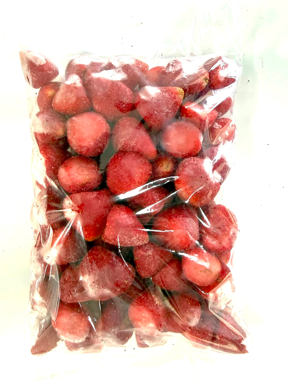 True Berry frozen whole strawberries in a food-grade HDPE bag